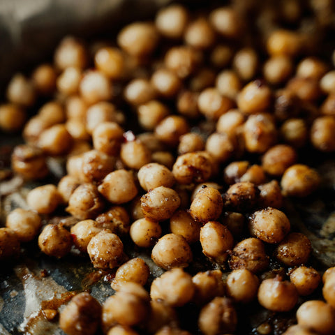 Crispy Roasted Chickpeas on a Parchment Lined Baking Sheet