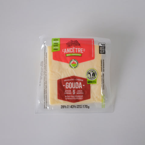 Packaged Gouda cheese with a red label on a white background