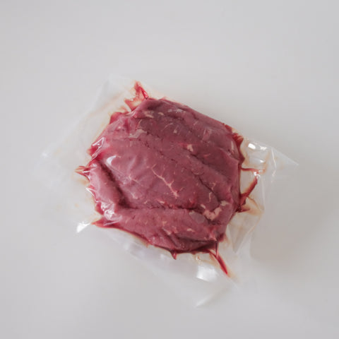 Raw beef on a white background