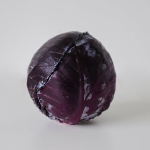 Purple cabbage on a white background